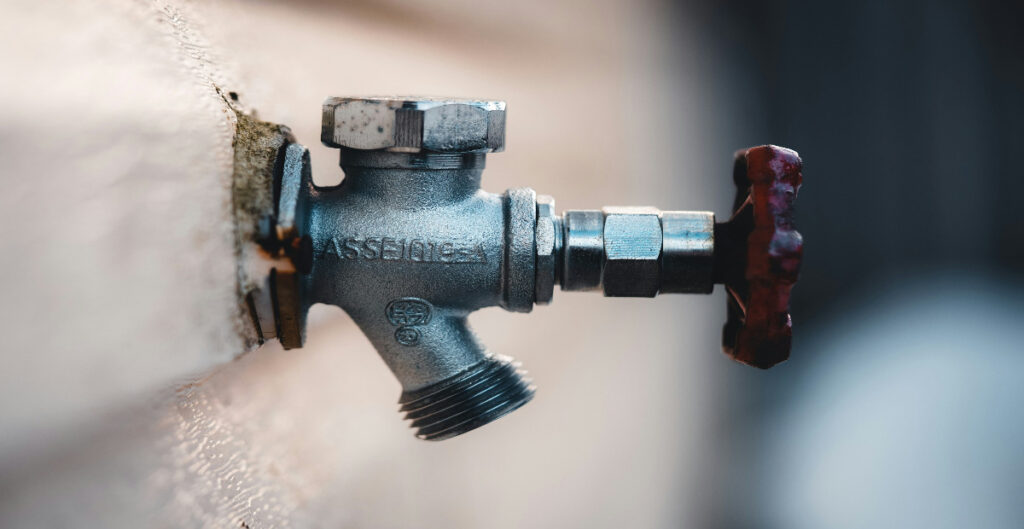 A water valve that is not switched on attached to a sink - Crest 247