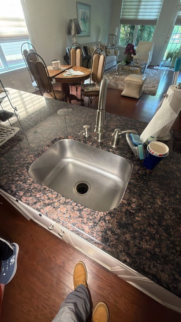 cleaning kitchen sink drain
